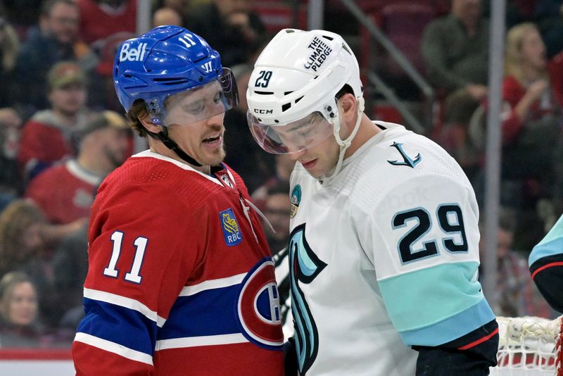 Dec 4, 2023; Montreal, Quebec, CAN; Montreal Canadiens forward Brendan Gallagher (11) and Seattle Kraken defenseman Vince Dunn (29) during the second period at the Bell Centre. Mandatory Credit: Eric Bolte-USA TODAY Sports