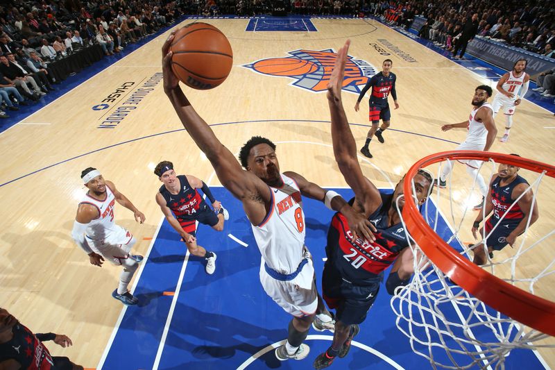 NEW YORK, NY - NOVEMBER 18: OG Anunoby #8 of the New York Knicks drives to the basket during the game against the Washington Wizards on November 18, 2024 at Madison Square Garden in New York City, New York.  NOTE TO USER: User expressly acknowledges and agrees that, by downloading and or using this photograph, User is consenting to the terms and conditions of the Getty Images License Agreement. Mandatory Copyright Notice: Copyright 2024 NBAE  (Photo by Nathaniel S. Butler/NBAE via Getty Images)