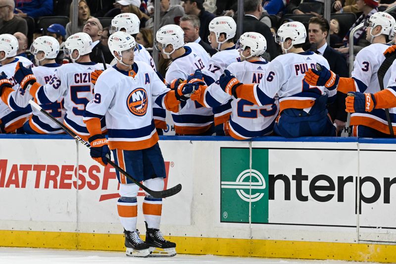 Apr 13, 2024; New York, New York, USA;  New York Islanders center Brock Nelson (29) celebrates his second goal of the period against the New York Rangers during the second period at Madison Square Garden. Mandatory Credit: Dennis Schneidler-USA TODAY Sports