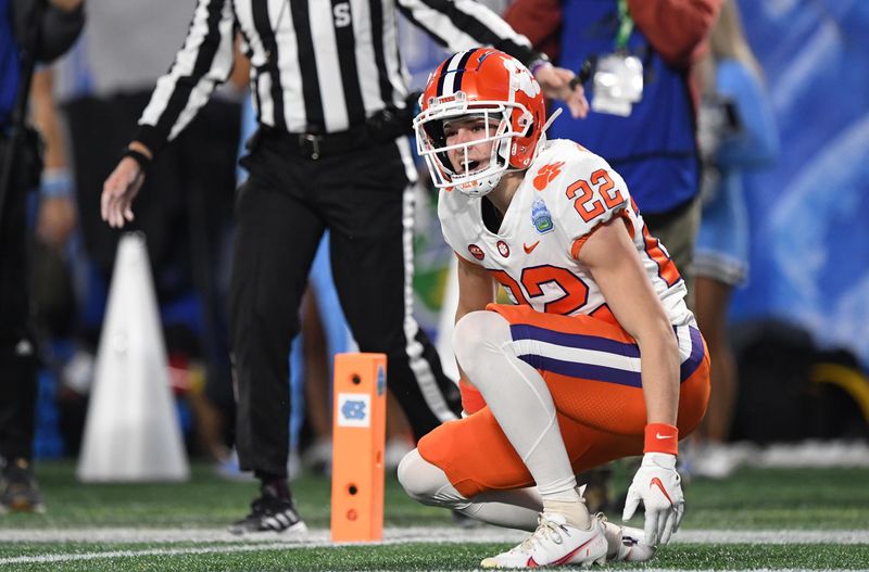 Dec 3, 2022; Charlotte, NC, USA; Clemson Tigers wide receiver Cole Turner (22) reacts after catching a long pass against the North Carolina Tar Heels during the second quarter of the ACC Championship game at Bank of America Stadium. Mandatory Credit: Ken Ruinard-USA TODAY NETWORK