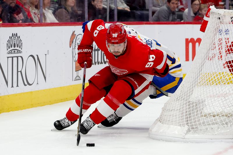 Mar 16, 2024; Detroit, Michigan, USA;  Detroit Red Wings defenseman Jake Walman (96) skates with the puck in the first period against the Buffalo Sabres at Little Caesars Arena. Mandatory Credit: Rick Osentoski-USA TODAY Sports