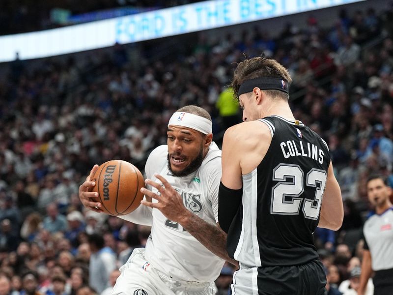 DALLAS, TX - NOVEMBER 16: Daniel Gafford #21 of the Dallas Mavericks drives to the basket during the game against the San Antonio Spurs on November 16, 2024 at American Airlines Center in Dallas, Texas. NOTE TO USER: User expressly acknowledges and agrees that, by downloading and or using this photograph, User is consenting to the terms and conditions of the Getty Images License Agreement. Mandatory Copyright Notice: Copyright 2024 NBAE (Photo by Glenn James/NBAE via Getty Images)