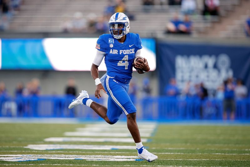 Sep 25, 2021; Colorado Springs, Colorado, USA; Air Force Falcons quarterback Haaziq Daniels (4) runs the ball in the first quarter against the Florida Atlantic Owls at Falcon Stadium. Mandatory Credit: Isaiah J. Downing-USA TODAY Sports