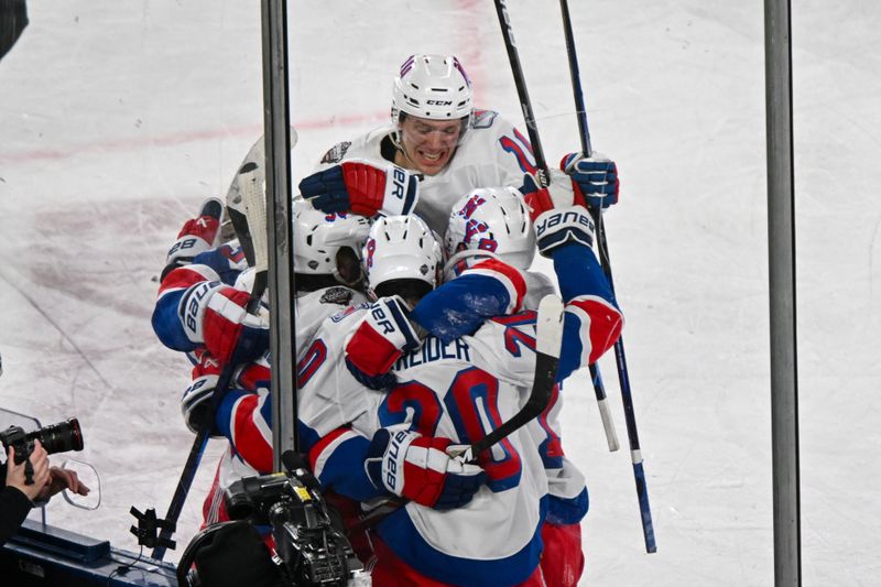 Feb 18, 2024; East Rutherford, New Jersey, USA;  New York Rangers center Mika Zibanejad (93) celebrates his game tying goal against the New York Islanders during the third period in a Stadium Series ice hockey game at MetLife Stadium. Mandatory Credit: Dennis Schneidler-USA TODAY Sports