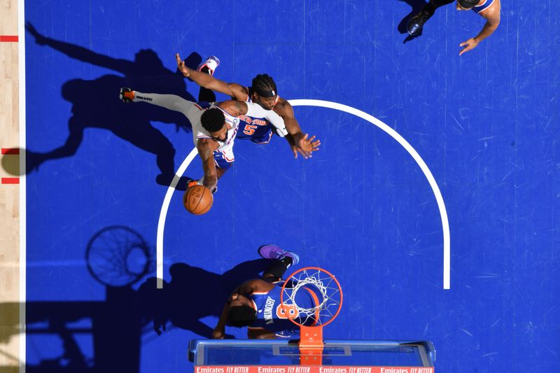 PHILADELPHIA, PA - JANUARY 15: Paul George #8 of the Philadelphia 76ers drives to the basket during the game against the New York Knicks on January 15, 2025 at the Wells Fargo Center in Philadelphia, Pennsylvania NOTE TO USER: User expressly acknowledges and agrees that, by downloading and/or using this Photograph, user is consenting to the terms and conditions of the Getty Images License Agreement. Mandatory Copyright Notice: Copyright 2025 NBAE (Photo by Jesse D. Garrabrant/NBAE via Getty Images)