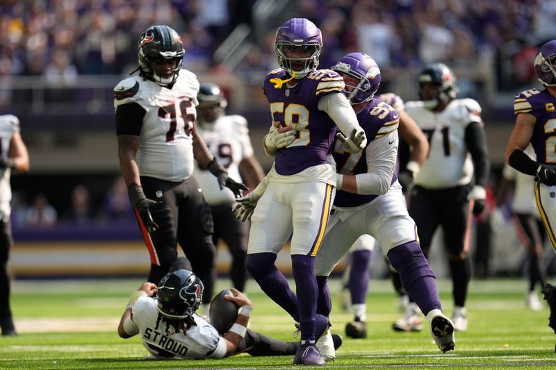 Minnesota Vikings linebacker Jonathan Greenard (58) celebrates after sacking Houston Texans quarterback C.J. Stroud (7) during the second half of an NFL football game, Sunday, Sept. 22, 2024, in Minneapolis. (AP Photo/Abbie Parr)
