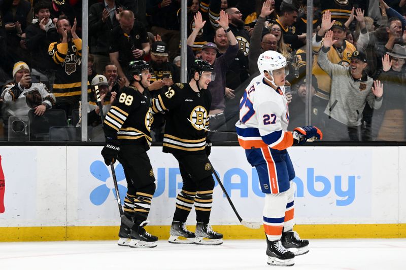 Nov 9, 2023; Boston, Massachusetts, USA; Boston Bruins center Charlie Coyle (13) celebrates with right wing David Pastrnak (88) after scoring a goal against the New York Islanders during the third period at the TD Garden. Mandatory Credit: Brian Fluharty-USA TODAY Sports