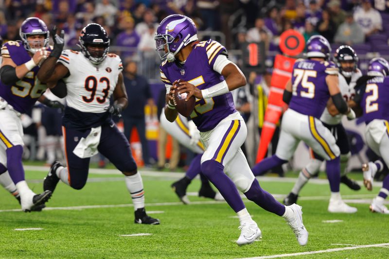 Minnesota Vikings quarterback Joshua Dobbs (15) runs up field during the first half of an NFL football game against the Chicago Bears, Monday, Nov. 27, 2023, in Minneapolis. (AP Photo/Bruce Kluckhohn)