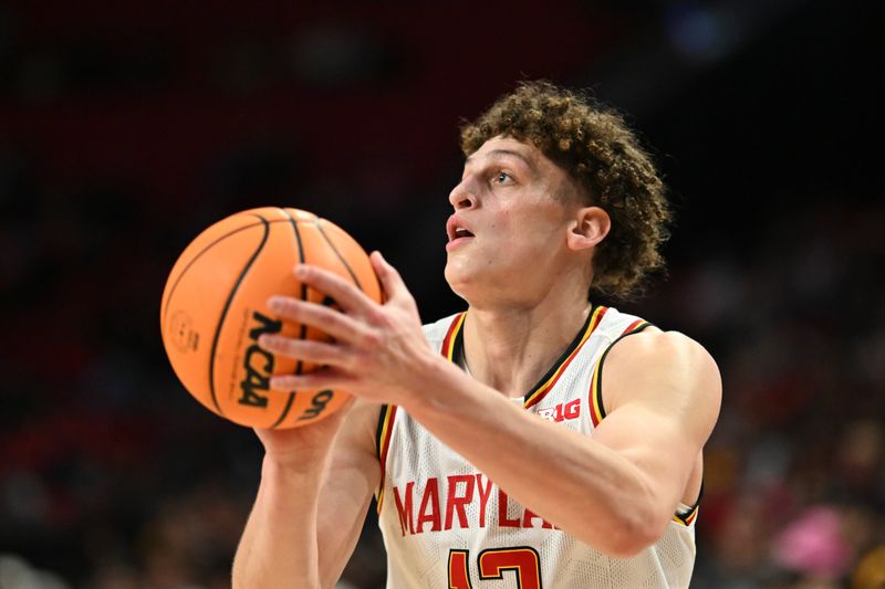 Feb 14, 2024; College Park, Maryland, USA;  Maryland Terrapins forward Jamie Kaiser Jr. (12) shoots a three point basket during the second half against the Iowa Hawkeyes at Xfinity Center. Mandatory Credit: Tommy Gilligan-USA TODAY Sports