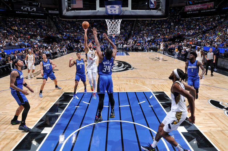 ORLANDO, FL - MARCH 10: Tyrese Haliburton #0 of the Indiana Pacers goes to the basket during the game on March 10, 2024 at Amway Center in Orlando, Florida. NOTE TO USER: User expressly acknowledges and agrees that, by downloading and or using this photograph, User is consenting to the terms and conditions of the Getty Images License Agreement. Mandatory Copyright Notice: Copyright 2024 NBAE (Photo by Fernando Medina/NBAE via Getty Images)