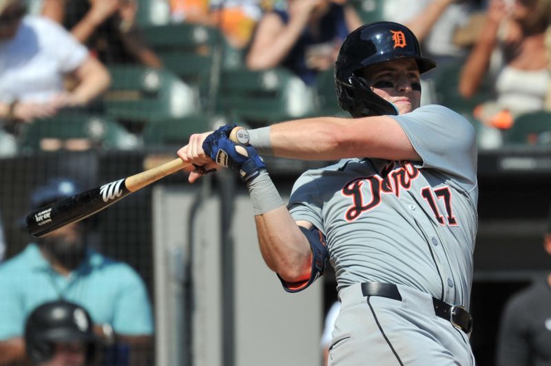 Aug 25, 2024; Chicago, Illinois, USA; Detroit Tigers second base Jace Jung (17) hits an RBI single during the fifth inning against the Chicago White Sox at Guaranteed Rate Field. Mandatory Credit: Patrick Gorski-USA TODAY Sports
