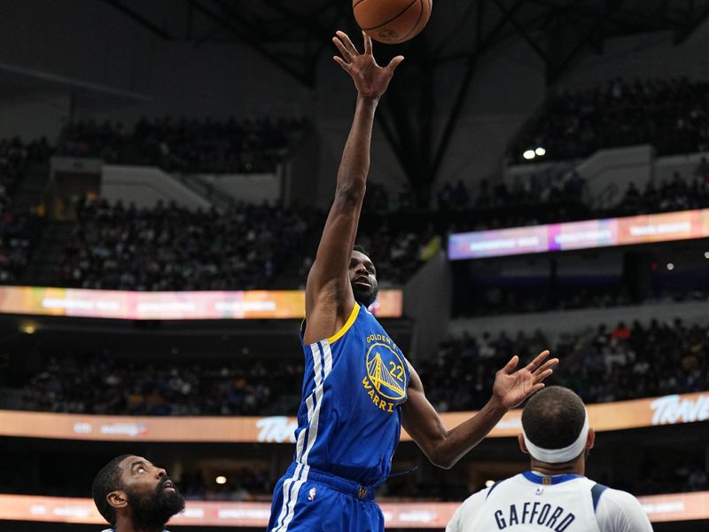 DALLAS, TX - MARCH 13: Andrew Wiggins #22 of the Golden State Warriors shoots the ball during the game against the Dallas Mavericks on March 13, 2024 at the American Airlines Center in Dallas, Texas. NOTE TO USER: User expressly acknowledges and agrees that, by downloading and or using this photograph, User is consenting to the terms and conditions of the Getty Images License Agreement. Mandatory Copyright Notice: Copyright 2024 NBAE (Photo by Glenn James/NBAE via Getty Images)