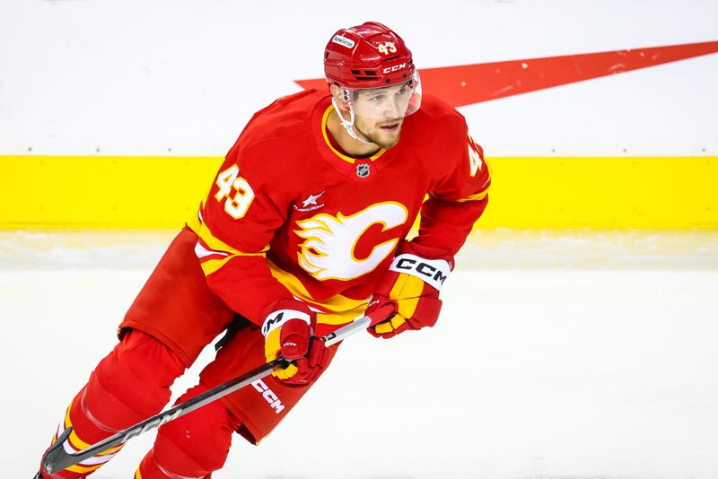 Sep 28, 2024; Calgary, Alberta, CAN; Calgary Flames right wing Adam Klapka (43) skates during the warmup period against the Vancouver Canucks at Scotiabank Saddledome. Mandatory Credit: Sergei Belski-Imagn Images