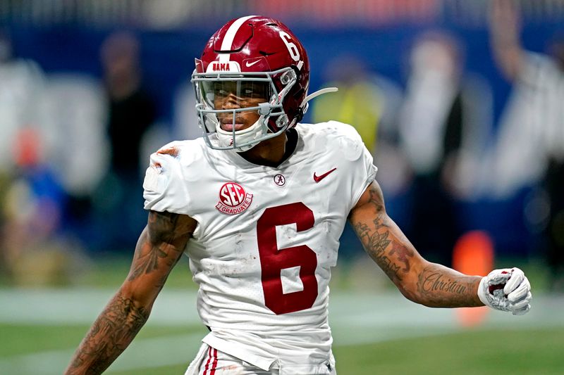 Dec 19, 2020; Atlanta, Georgia, USA; Alabama Crimson Tide wide receiver DeVonta Smith (6) reacts after scoring a touchdown during the fourth quarter against the Florida Gators in the SEC Championship at Mercedes-Benz Stadium. Mandatory Credit: Dale Zanine-USA TODAY Sports