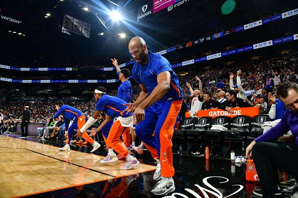 PHOENIX, AZ - DECEMBER 15: The New York Knicks bench celebrates a three point basket during the game against the Phoenix Suns on December 15, 2023 at Footprint Center in Phoenix, Arizona. NOTE TO USER: User expressly acknowledges and agrees that, by downloading and or using this photograph, user is consenting to the terms and conditions of the Getty Images License Agreement. Mandatory Copyright Notice: Copyright 2023 NBAE (Photo by Kate Frese/NBAE via Getty Images)