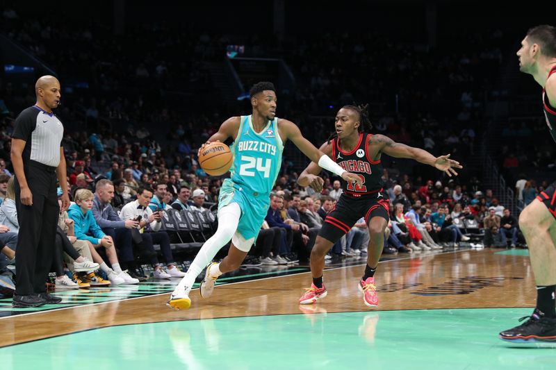 CHARLOTTE, NC - JANUARY 31: Brandon Miller #24 of the Charlotte Hornets dribbles the ball during the game against the Chicago Bulls on January 31, 2024 at Spectrum Center in Charlotte, North Carolina. NOTE TO USER: User expressly acknowledges and agrees that, by downloading and or using this photograph, User is consenting to the terms and conditions of the Getty Images License Agreement.  Mandatory Copyright Notice:  Copyright 2024 NBAE (Photo by Brock Williams-Smith/NBAE via Getty Images)