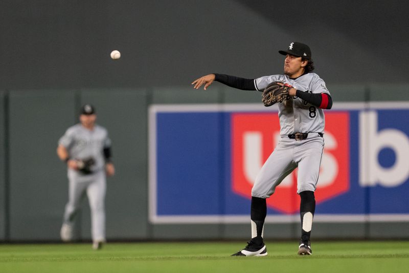 Apr 23, 2024; Minneapolis, Minnesota, USA; Chicago White Sox second baseman Nicky Lopez (8) throws to second retiring Minnesota Twins catcher Christian Vazquez (not pictured) in the eighth inning at Target Field. Mandatory Credit: Matt Blewett-USA TODAY Sports