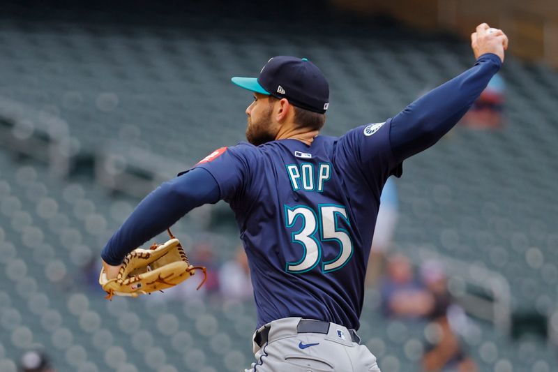 Jun 26, 2025; Minneapolis, Minnesota, USA; Seattle Mariners relief pitcher Zach Pop (35) throws to the Minnesota Twins in the sixth inning at Target Field. Mandatory Credit: Bruce Kluckhohn-Imagn Images