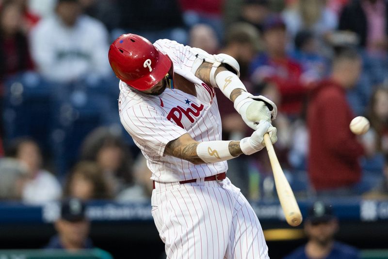 Apr 26, 2023; Philadelphia, Pennsylvania, USA; Philadelphia Phillies right fielder Nick Castellanos (8) hits a two RBI home run during the first inning against the Seattle Mariners at Citizens Bank Park. Mandatory Credit: Bill Streicher-USA TODAY Sports