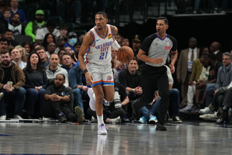 DALLAS, TX - JANUARY 17:  Aaron Wiggins #21 of the Oklahoma City Thunder dribbles the ball during the game against the Dallas Mavericks on January 17, 2025 at American Airlines Center in Dallas, Texas. NOTE TO USER: User expressly acknowledges and agrees that, by downloading and or using this photograph, User is consenting to the terms and conditions of the Getty Images License Agreement. Mandatory Copyright Notice: Copyright 2025 NBAE (Photo by Glenn James/NBAE via Getty Images)