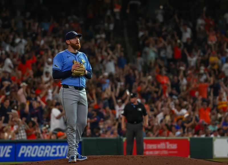 Aug 3, 2024; Houston, Texas, USA; Tampa Bay Rays starting pitcher Zack Littell (52) reacts after allowing a home run to Houston Astros first baseman Jon Singleton (not pictured) in the third inning at Minute Maid Park. Mandatory Credit: Thomas Shea-USA TODAY Sports