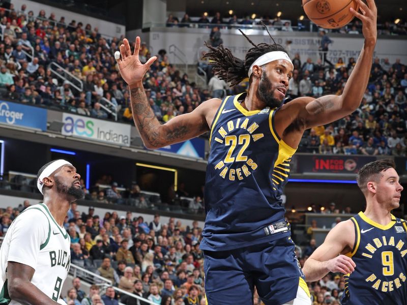 INDIANAPOLIS, IN - JANUARY 3: Isaiah Jackson #22 of the Indiana Pacers rebounds the ball during the game against the Milwaukee Bucks on January 3, 2024 at Gainbridge Fieldhouse in Indianapolis, Indiana. NOTE TO USER: User expressly acknowledges and agrees that, by downloading and or using this Photograph, user is consenting to the terms and conditions of the Getty Images License Agreement. Mandatory Copyright Notice: Copyright 2024 NBAE (Photo by Jeff Haynes/NBAE via Getty Images)