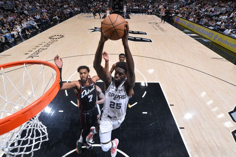 SAN ANTONIO, TX - APRIL 14: Sidy Cissoko #25 of the San Antonio Spurs dunks the ball during the game  against the Detroit Pistons on April 14, 2024 at the Frost Bank Center in San Antonio, Texas. NOTE TO USER: User expressly acknowledges and agrees that, by downloading and or using this photograph, user is consenting to the terms and conditions of the Getty Images License Agreement. Mandatory Copyright Notice: Copyright 2024 NBAE (Photos by Michael Gonzales/NBAE via Getty Images)