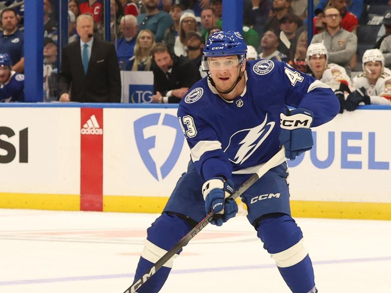 Apr 25, 2024; Tampa, Florida, USA; Tampa Bay Lightning defenseman Darren Raddysh (43) passes the puck against the Florida Panthers during the first period in game three of the first round of the 2024 Stanley Cup Playoffs at Amalie Arena. Mandatory Credit: Kim Klement Neitzel-USA TODAY Sports