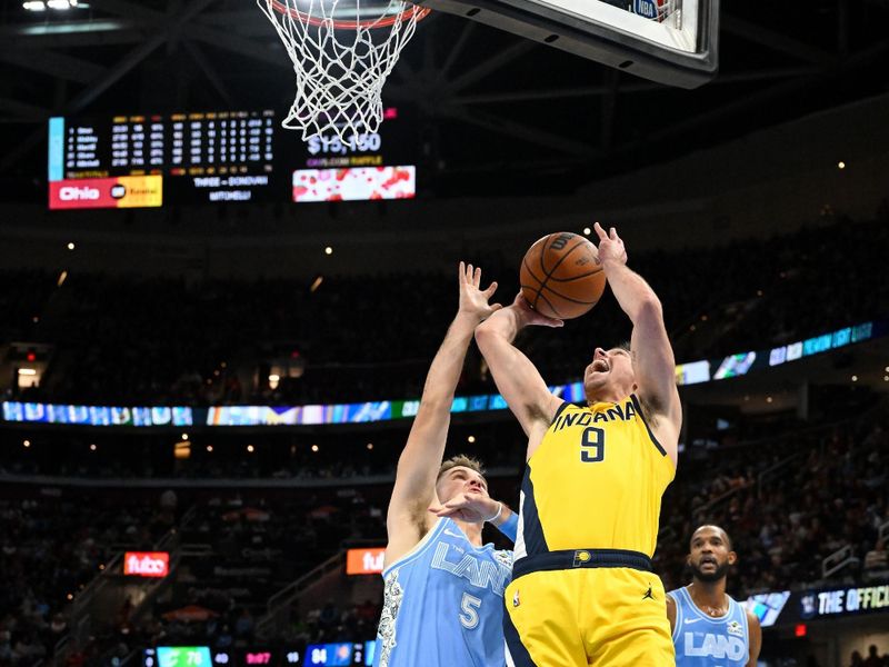 CLEVELAND, OH - JANUARY 12: T.J. McConnell #9 of the Indiana Pacers shoots the ball during the game against the Cleveland Cavaliers on January 12, 2025 at Rocket Mortgage FieldHouse in Cleveland, Ohio. NOTE TO USER: User expressly acknowledges and agrees that, by downloading and/or using this Photograph, user is consenting to the terms and conditions of the Getty Images License Agreement. Mandatory Copyright Notice: Copyright 2025 NBAE (Photo by Brian Kolin/NBAE via Getty Images)