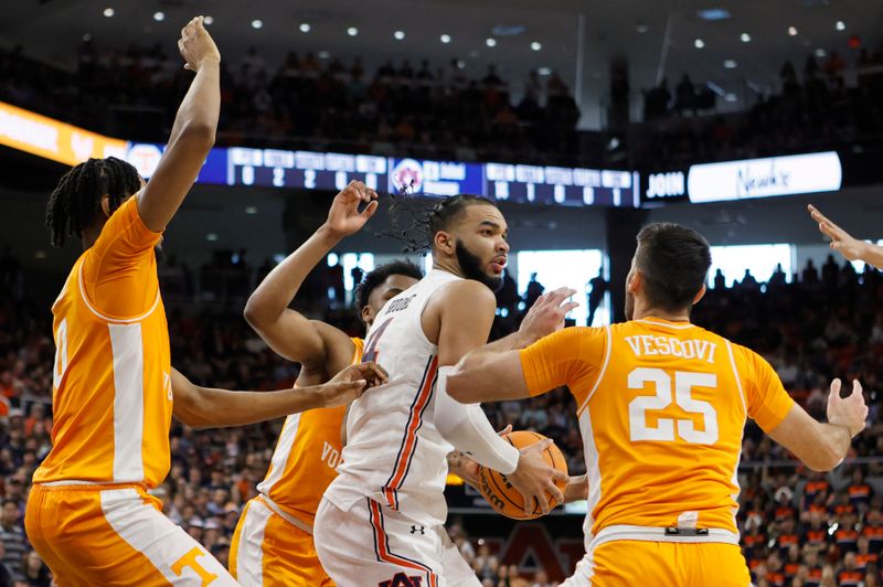 Mar 4, 2023; Auburn, Alabama, USA;  Auburn Tigers forward Johni Broome (4) controls the ball against the Tennessee Volunteers during the second half at Neville Arena. Mandatory Credit: John Reed-USA TODAY Sports