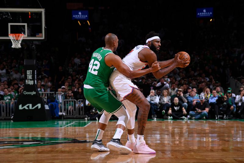 BOSTON, MA - MAY 7: Mitchell Robinson #23 of the New York Knicks handles the ball during the game against the Boston Celtics during Round 2 Game 2 on May 7, 2025 at TD Garden in Boston, Massachusetts. NOTE TO USER: User expressly acknowledges and agrees that, by downloading and/or using this Photograph, user is consenting to the terms and conditions of the Getty Images License Agreement. Mandatory Copyright Notice: Copyright 2025 NBAE (Photo by Brian Babineau/NBAE via Getty Images)