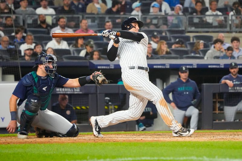 Jun 22, 2023; Bronx, New York, USA; New York Yankees first baseman Anthony Rizzo (48) hits a single against the Seattle Mariners during the sixth inning at Yankee Stadium. Mandatory Credit: Gregory Fisher-USA TODAY Sports