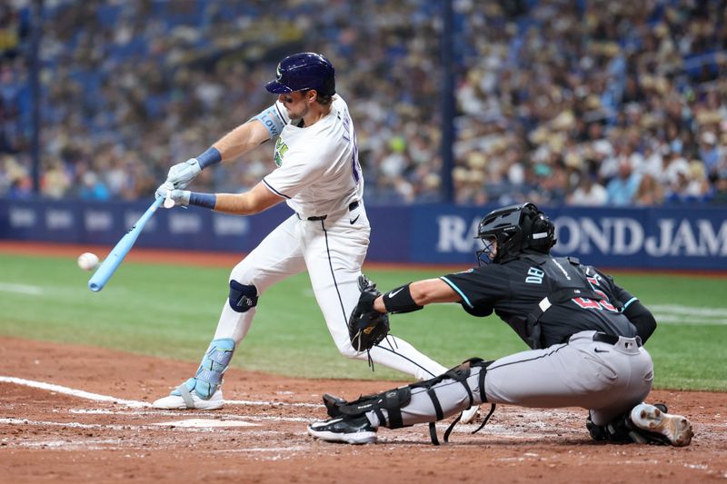 Aug 16, 2024; St. Petersburg, Florida, USA; Tampa Bay Rays outfielder Josh Lowe (15) doubles against the Arizona Diamondbacks in the fourth inning at Tropicana Field. Mandatory Credit: Nathan Ray Seebeck-USA TODAY Sports