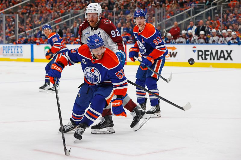 Apr 13, 2026; Edmonton, Alberta, CAN; Edmonton Oilers forward Issac Howard (53) and Colorado Avalanche forward Gabriel Landeskog (92) looks for a loose puck during the second period at Rogers Place. Mandatory Credit: Perry Nelson-Imagn Images Apr 13, 2026; Edmonton, Alberta, CAN; Edmonton Oilers forward Issac Howard (53) and Colorado Avalanche forward Gabriel Landeskog (92) looks for a loose puck during the second period at Rogers Place. Mandatory Credit: Perry Nelson-Imagn Images