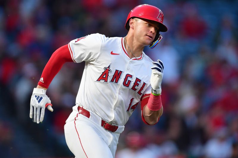 Apr 23, 2024; Anaheim, California, USA; Los Angeles Angels catcher Logan O'Hoppe (14) runs after hitting an RBI double against the Baltimore Orioles during the third inning at Angel Stadium. Mandatory Credit: Gary A. Vasquez-USA TODAY Sports