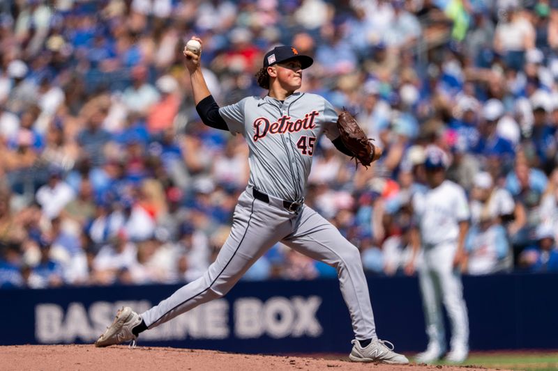 Jul 20, 2024; Toronto, Ontario, CAN; Detroit Tigers pitcher Reese Olson (45) pitches to the Toronto Blue Jays during the first inning at Rogers Centre. Mandatory Credit: Kevin Sousa-USA TODAY Sports