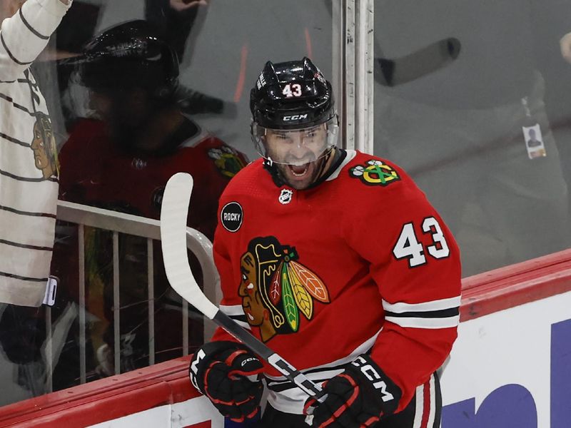 Mar 10, 2024; Chicago, Illinois, USA; Chicago Blackhawks center Colin Blackwell (43) celebrates after scoring against the Arizona Coyotes during the third period at United Center. Mandatory Credit: Kamil Krzaczynski-USA TODAY Sports