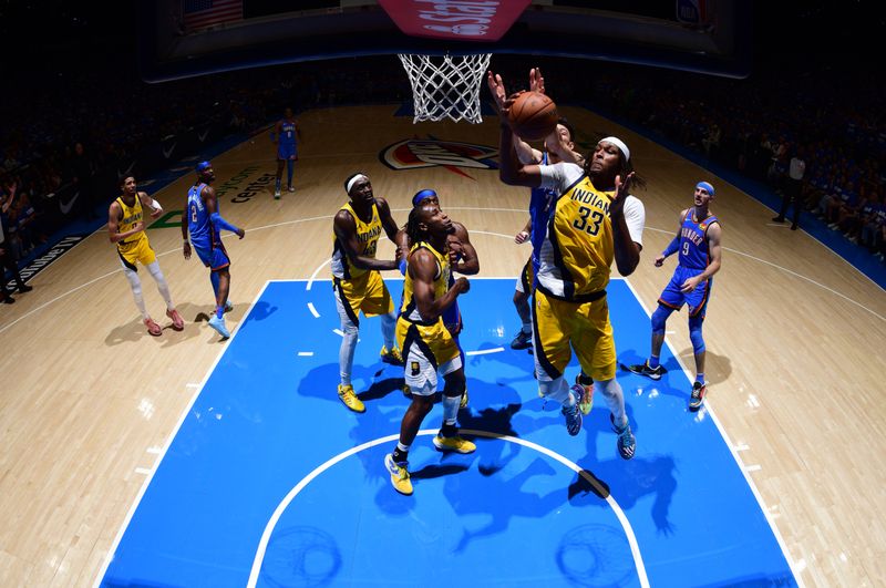 OKLAHOMA CITY, OK - JUNE 8: Myles Turner #33 of the Indiana Pacers drives to the basket during the game against the Oklahoma City Thunder during Game One of the 2025 NBA Finals on June 8, 2025 at Paycom Center in Oklahoma City, Oklahoma. NOTE TO USER: User expressly acknowledges and agrees that, by downloading and or using this photograph, User is consenting to the terms and conditions of the Getty Images License Agreement. Mandatory Copyright Notice: Copyright 2025 NBAE (Photo byGarrett Ellwood /NBAE via Getty Images)