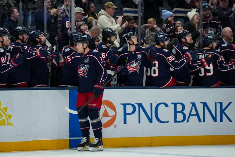 Dec 13, 2025; Columbus, Ohio, USA;  Columbus Blue Jackets center Charlie Coyle (3) celebrates with teammates after scoring a goal against the Vegas Golden Knights in the first period at Nationwide Arena. Mandatory Credit: Aaron Doster-Imagn Images