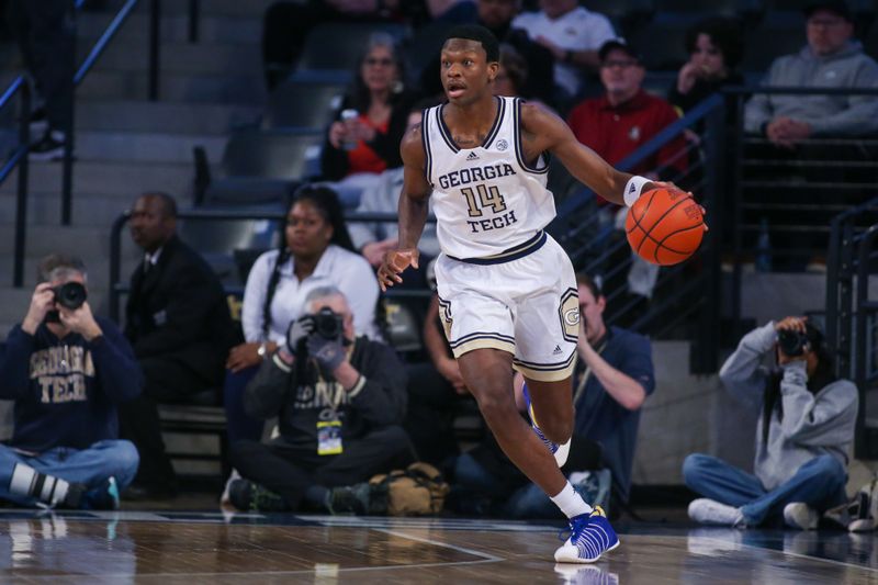 Mar 2, 2024; Atlanta, Georgia, USA; Georgia Tech Yellow Jackets guard Kowacie Reeves Jr. (14) dribbles against the Florida State Seminoles in the first half at McCamish Pavilion. Mandatory Credit: Brett Davis-USA TODAY Sports