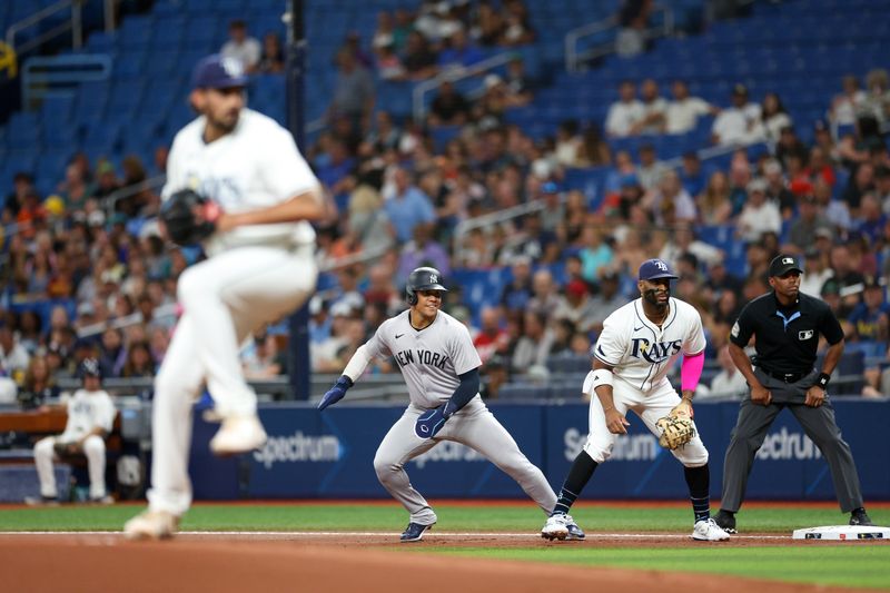 Jul 10, 2024; St. Petersburg, Florida, USA;  New York Yankees outfielder Juan Soto (22) looks to run against the Tampa Bay Rays in the first inning at Tropicana Field. Mandatory Credit: Nathan Ray Seebeck-USA TODAY Sports