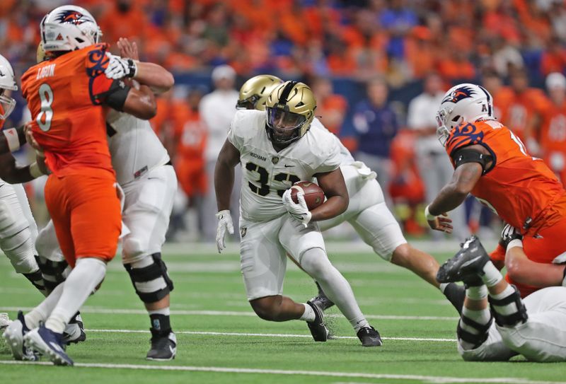 Sep 15, 2023; San Antonio, Texas, USA; Army Black Knights running back Jakobi Buchanan (33) runs with the ball against the UTSA Roadrunners during the first half at the Alamodome. Mandatory Credit: Danny Wild-USA TODAY Sports