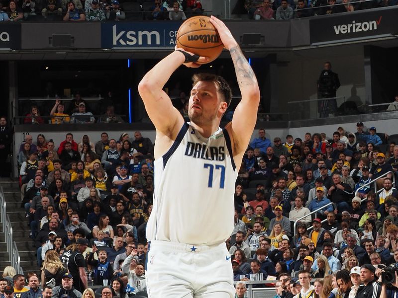 INDIANAPOLIS, IN - MARCH 27: Luka Doncic #77 of the Dallas Mavericks shoots the ball during the game against the Indiana Pacers on March 27, 2023 at Gainbridge Fieldhouse in Indianapolis, Indiana. NOTE TO USER: User expressly acknowledges and agrees that, by downloading and or using this Photograph, user is consenting to the terms and conditions of the Getty Images License Agreement. Mandatory Copyright Notice: Copyright 2023 NBAE (Photo by Ron Hoskins/NBAE via Getty Images)