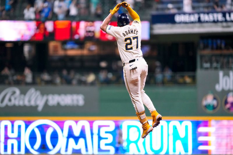 Aug 27, 2024; Milwaukee, Wisconsin, USA;  Milwaukee Brewers shortstop Willy Adames (27) celebrates after hitting a home run during the sixth inning against the San Francisco Giants at American Family Field. Mandatory Credit: Jeff Hanisch-USA TODAY Sports