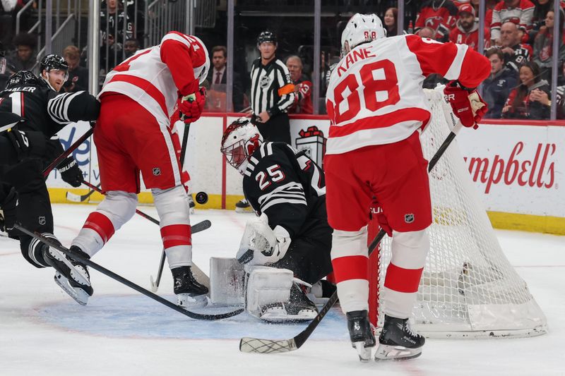 Nov 24, 2025; Newark, New Jersey, USA; New Jersey Devils goaltender Jacob Markstrom (25) makes a save against the Detroit Red Wings during the third period at Prudential Center. Mandatory Credit: Ed Mulholland-Imagn Images