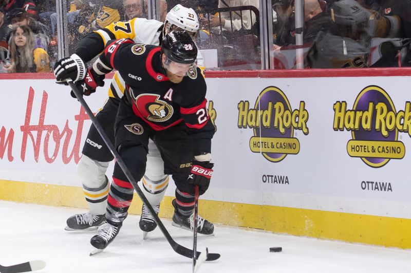 Dec 14, 2024; Ottawa, Ontario, CAN; Pittsburgh Penguins defenseman Ryan Graves (27) battles with Ottawa Senators right wing Claude Giroux (28) in the first period at the Canadian Tire Centre. Mandatory Credit: Marc DesRosiers-Imagn Images