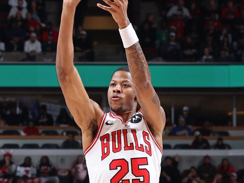 CHICAGO, IL - JANUARY 12: Dalen Terry #25 of the Chicago Bulls three point basket during the game against the Golden State Warriors on January 12, 2024 at United Center in Chicago, Illinois. NOTE TO USER: User expressly acknowledges and agrees that, by downloading and or using this photograph, User is consenting to the terms and conditions of the Getty Images License Agreement. Mandatory Copyright Notice: Copyright 2024 NBAE (Photo by Jeff Haynes/NBAE via Getty Images)