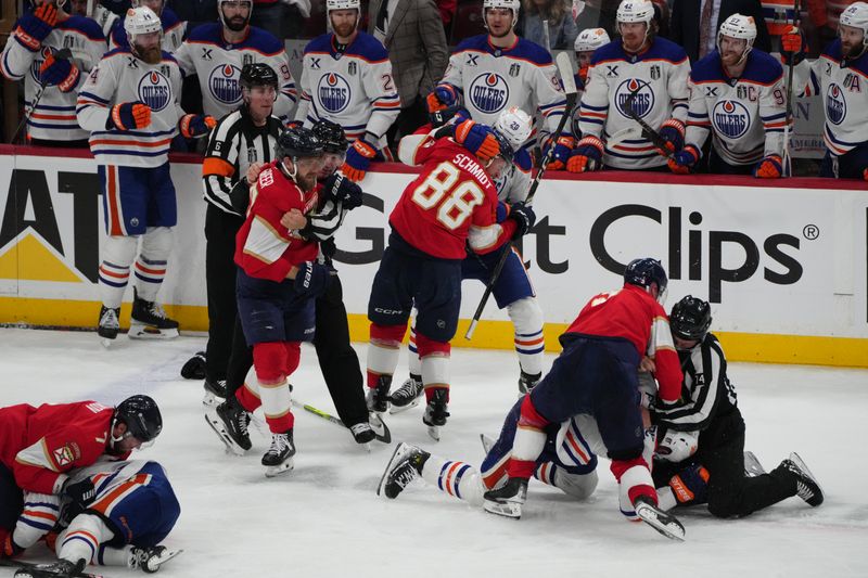 Jun 9, 2025; Sunrise, Florida, USA; A fight breaks out during the third period between Florida Panthers and Edmonton Oilers in game three of the 2025 Stanley Cup Final at Amerant Bank Arena. Mandatory Credit: Jim Rassol-Imagn Images