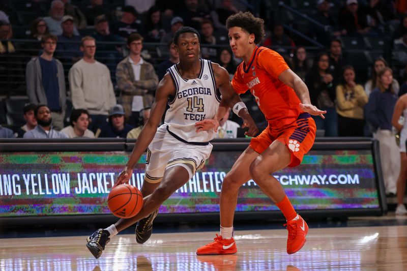 Feb 21, 2024; Atlanta, Georgia, USA; Georgia Tech Yellow Jackets guard Kowacie Reeves Jr. (14) drives on Clemson Tigers forward Jack Clark (5) in the second half at McCamish Pavilion. Mandatory Credit: Brett Davis-USA TODAY Sports