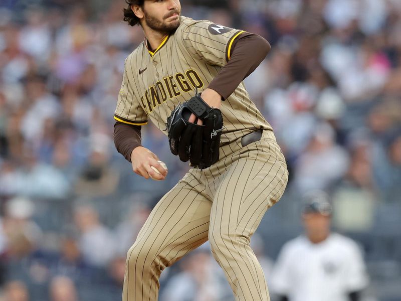 May 7, 2025; Bronx, New York, USA; San Diego Padres starting pitcher Dylan Cease (84) pitches against the New York Yankees during the first inning at Yankee Stadium. Mandatory Credit: Brad Penner-Imagn Images